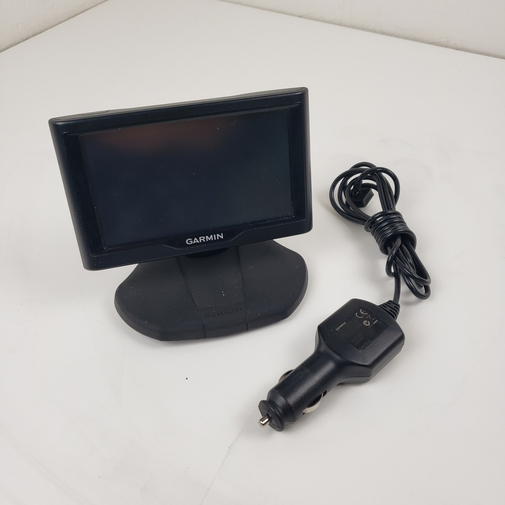 Garmin Nuvi 57LM 5 Inch GPS Navigator with Dashboard Mount + 32GB SD Card Bundle